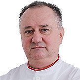 Врач Романов Евгений Николаевич