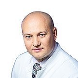 Врач Толмах Роман Евгеньевич